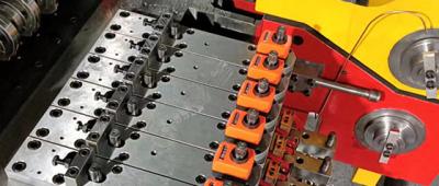 Різниця між верстатами для висадки болтів і верстатами для висадки деталей